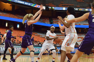 Senior point guard Alexis Peterson (with ball) leads the ACC in scoring, but Syracuse is no longer among the conference's teams ranked in the Top 25. 